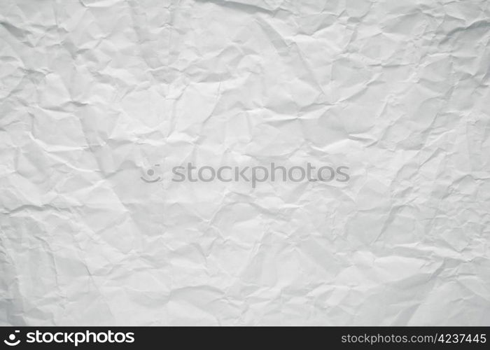 Crumpled white office paper texture.