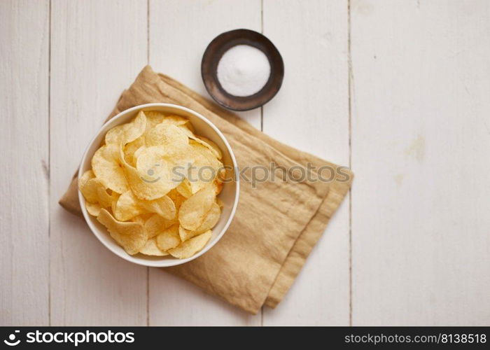 Crunchy delicious potato chips for a tasty snack break. . Potato chips for a tasty snack break.