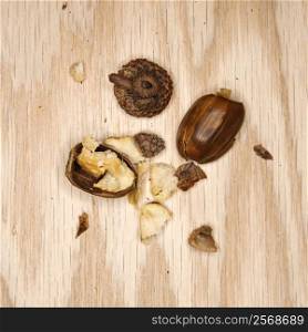 Crushed acorn on wood.