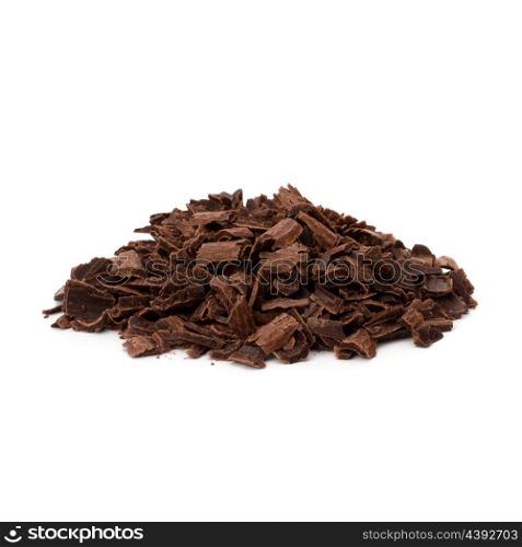 Crushed chocolate shavings pile isolated on white background