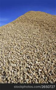 crushed pound stone mound quarry open blue sky