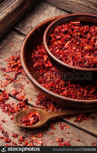 Crushed red cayenne pepper.Spice for meat dishes. Dried red chilli flakes
