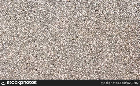 Crushed small stone texture background, rock backdrop