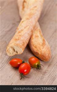 Crusty baguette bread and fresh tomatoes