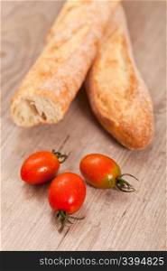 Crusty baguette bread and fresh tomatoes