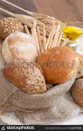 Crusty fresh bread assortment background