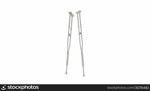 Crutches spin on white background