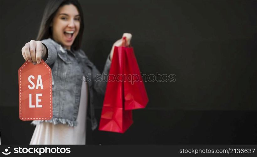 crying woman with shopping packets sale tablet