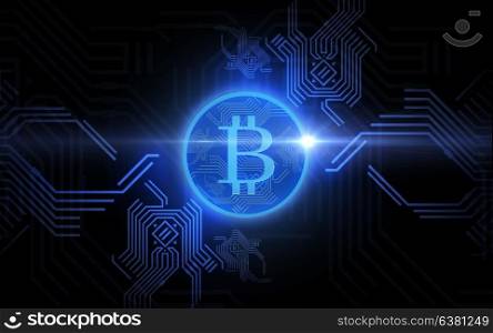 cryptocurrency, finance and business concept - blue bitcoin projection over black background. blue bitcoin projection over black background