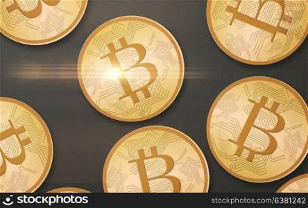 cryptocurrency, finance and business concept - gold bitcoins over gray background from top. gold bitcoins over gray background from top
