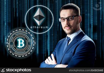 cryptocurrency, financial technology and business concept - businessman with ethereum and bitcoin holograms over binary code background. businessman with cryptocurrency holograms. businessman with cryptocurrency holograms