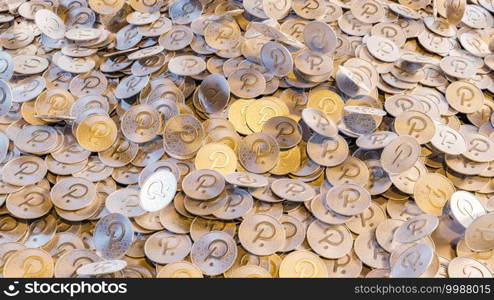 Cryptocurrency Polka DOT golden coins spilling on the table.Crypto investment concept background. Cryptocurrency Polka DOT golden coins spilling on the table.
