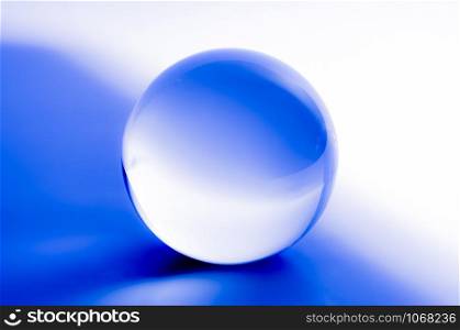 Crystal ball in abstract blue