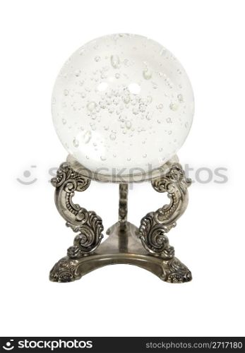 Crystal ball on a silver stand for seeing into the future with miniature bubbles inside