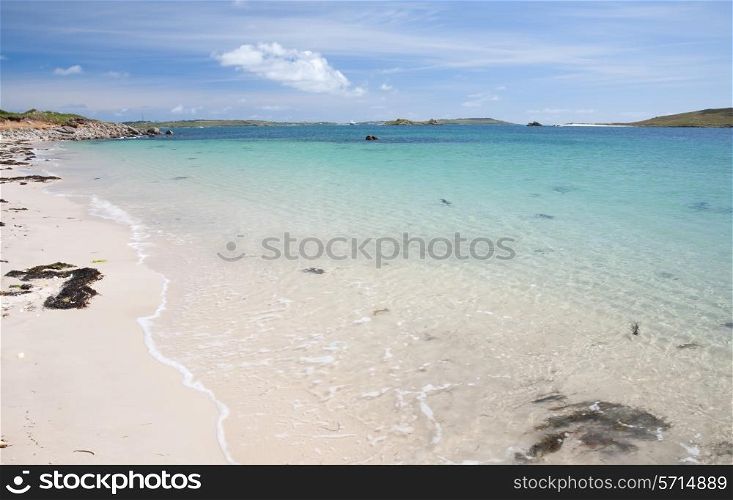 Crystal clear waters at Rushy Bay, Bryher, Isles of Scilly, Cornwall, England.