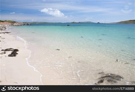 Crystal clear waters at Rushy Bay, Bryher, Isles of Scilly, Cornwall, England.