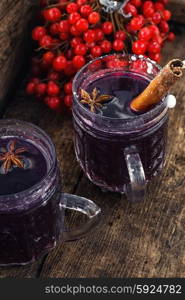 Crystal goblet with mulled wine and cinnamon stick