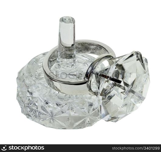 Crystal ring holder with an oversized diamond engagement ring