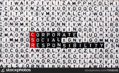 CSR Corporate Social Responsibility written on black and white cubes