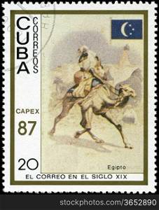 CUBA - CIRCA 1987: A stamp printed in the Cuba, shows traditional old vehicles. Egyptian camel, circa 1987