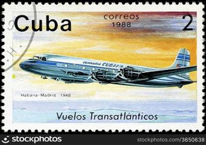 CUBA - CIRCA 1988: A Stamp printed in CUBA shows image of the airplane in transatlantic flight, Habana - Madrid in 1948, circa 1988