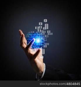 Cube in male hand. Businessman hand take digital cube as thinking outside the box concept