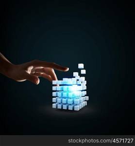 Cube in male hand. Businessman hand touch digital cube as thinking outside the box concept