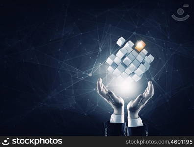 Cube in male hand. Conceptual image with 3D rendering cube figure in male palms