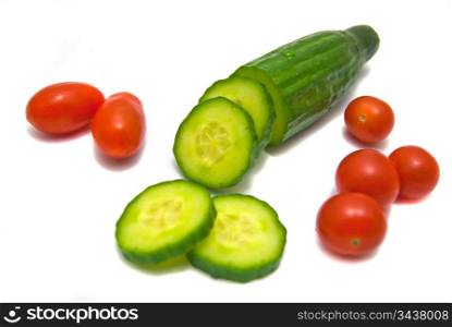 cucumber and cherry tomatoes on white background