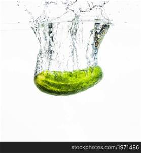 cucumber falling water water splash against white background. High resolution photo. cucumber falling water water splash against white background. High quality photo