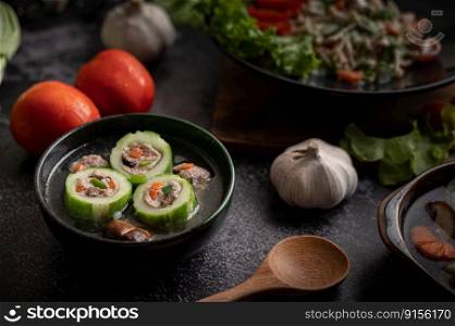 Cucumber soup stuffed with pork, with carrots, chopped green onions, shiitake mushrooms and garlic and.