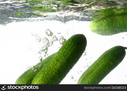 cucumber splash isolated on white background