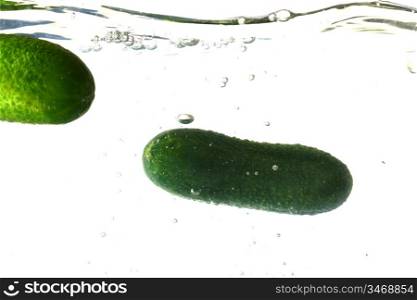 cucumber splash isolated on white background