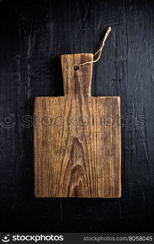 culinary background with wooden cutting board