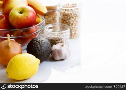 Culinary, cooking and healthy food concept. Food ingredients on white table with notebook for checklist
