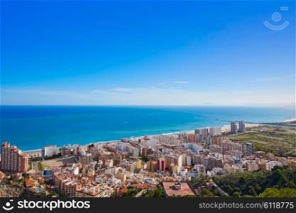 Cullera beach aerial with skyline of village in Mediterranean Valencia of Spain