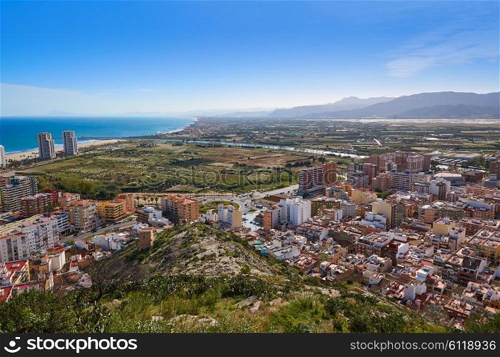 Cullera beach aerial with skyline of village in Mediterranean Valencia of Spain