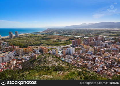 Cullera beach aerial with skyline of village in Mediterranean Valencia of Spain