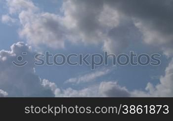 cumulous clouds time-lapse in blu sky