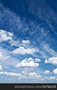 Cumulus and cirrus clouds