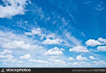 cumulus and cirrus clouds in blue sky