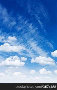 cumulus and cirrus clouds on a beautyful blue sky