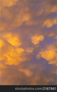 Cumulus and Stratus clouds in dramatic sunset sky over Cape Town South Africa