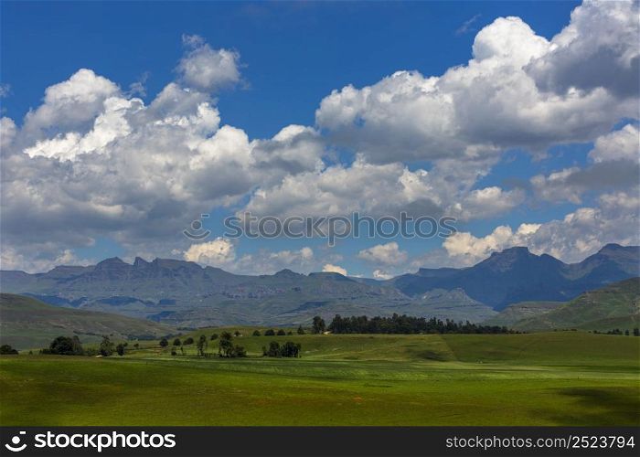 Cumulus clouds gather above the Drakensberg South Africa