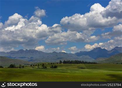 Cumulus clouds gather above the Drakensberg South Africa
