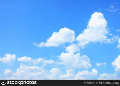 Cumulus clouds in the blue sky with copyspace