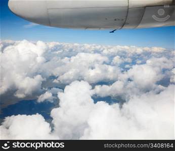 Cumulus clouds - view from the window of a turbo-propeller aircraft