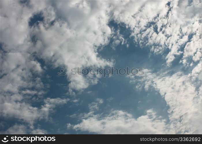 Cumulus with a gleam on the blue sky