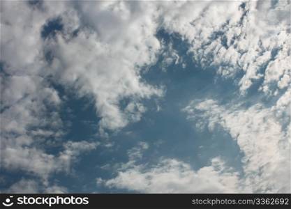 Cumulus with a gleam on the blue sky