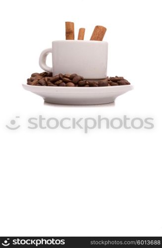 Cup and coffee beans, isolated over white background